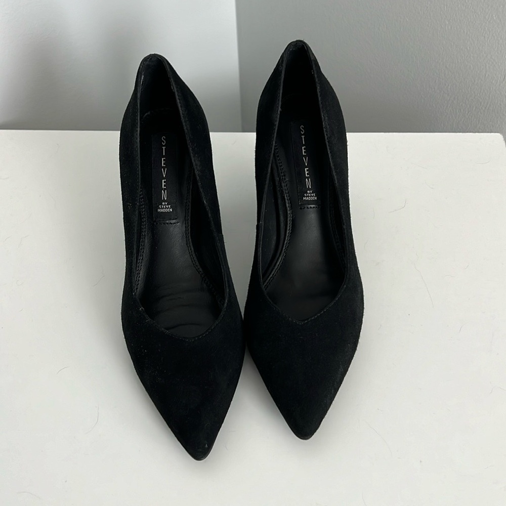 Black suede pumps